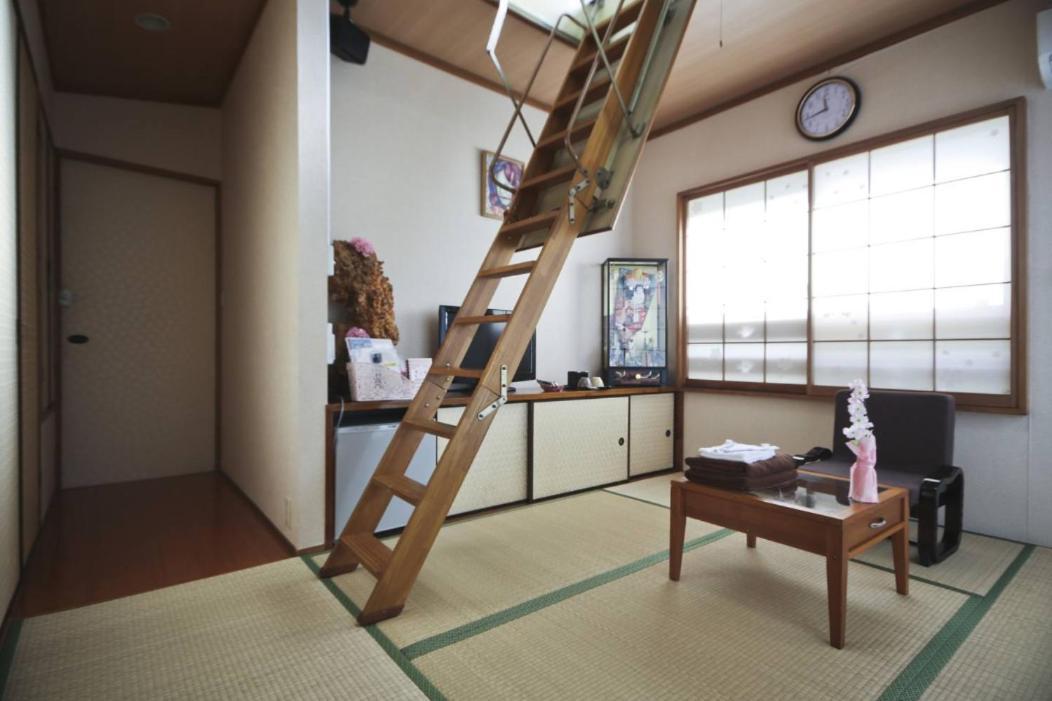 Casa de hóspedes 旅館さくら城